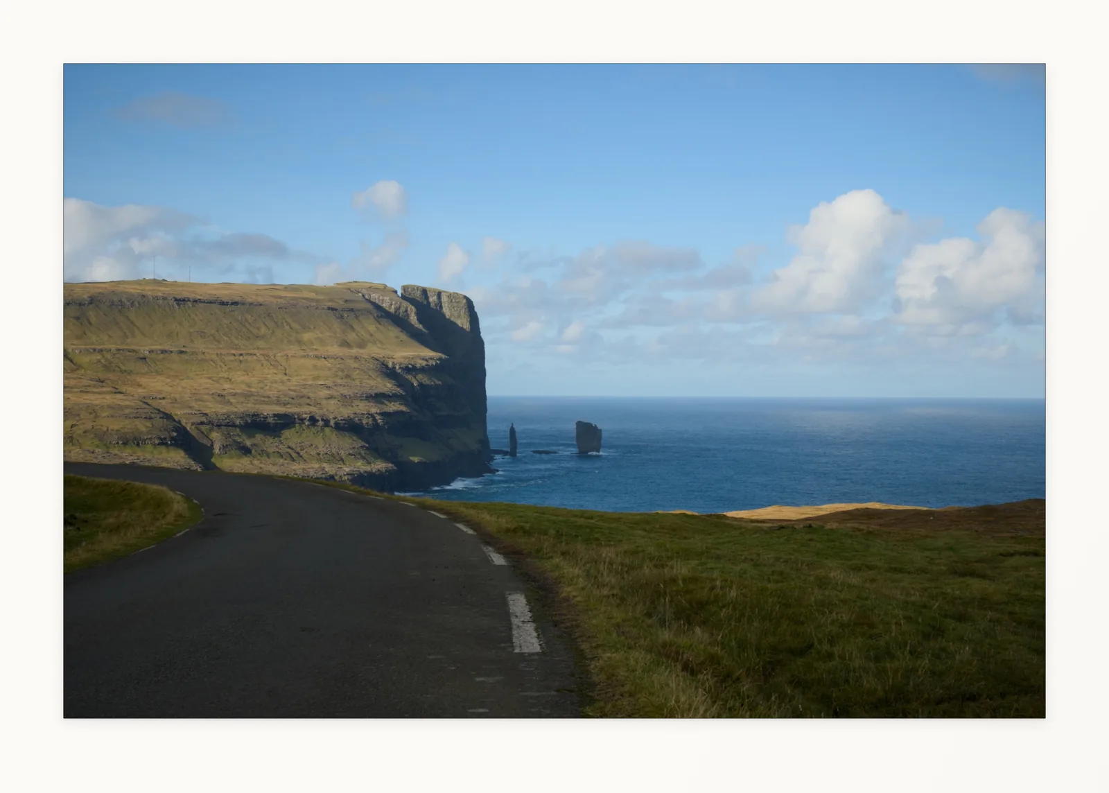 A coastal road framed in Frame