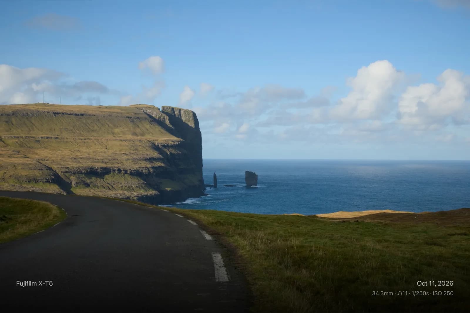 A coastal road framed in Inset